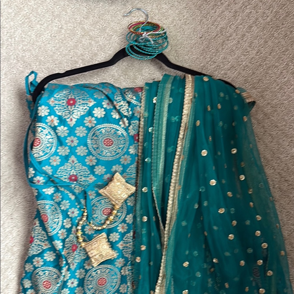 Elegant Blue and Gold Lehenga/Saree with Bangles